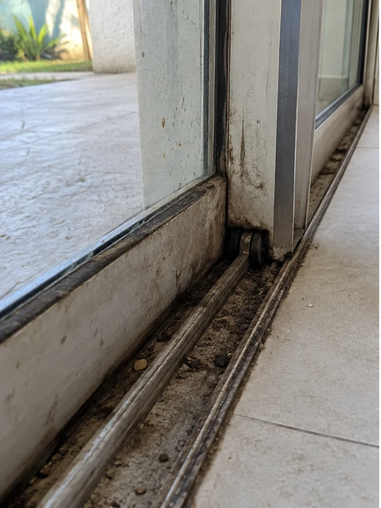 Evaluating a sliding door frame for repair versus replacement