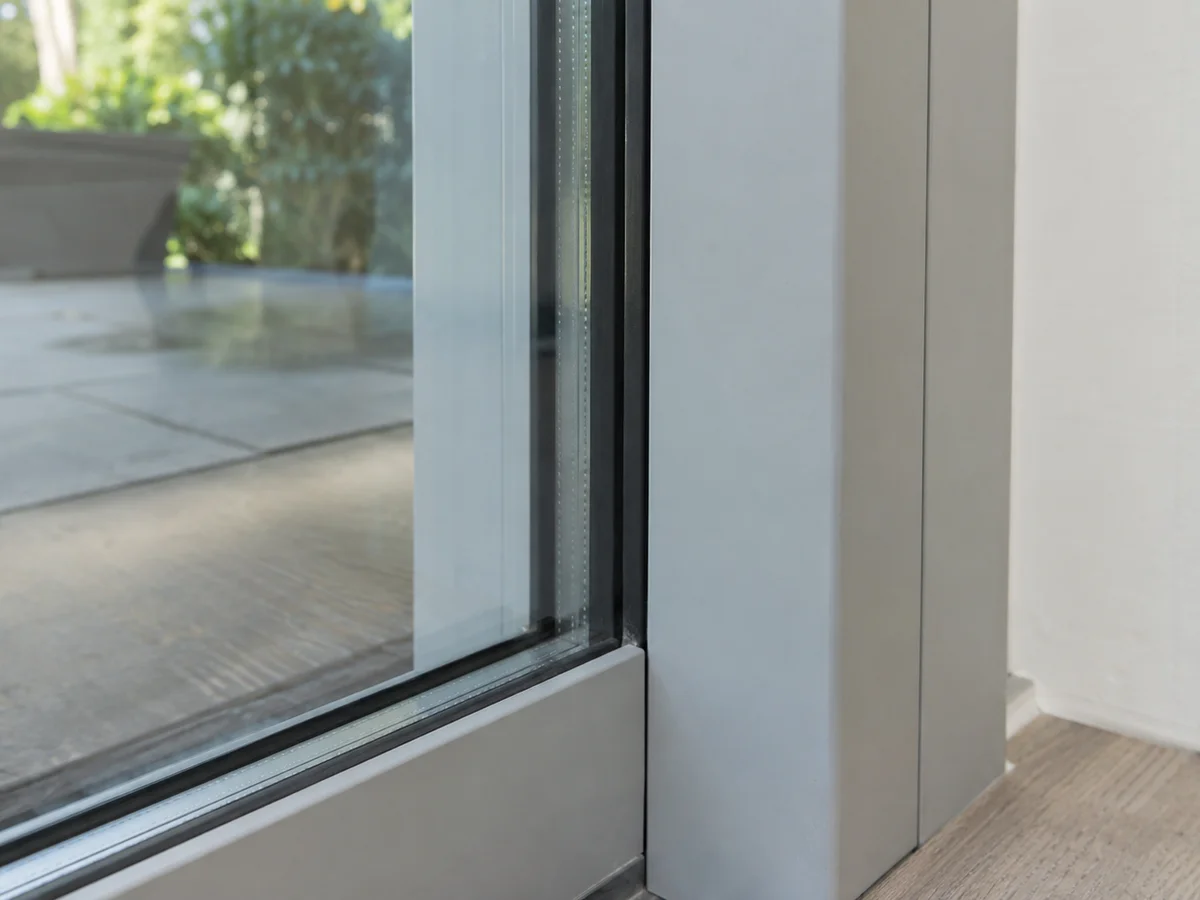 Gap at the sliding door jamb letting in air and moisture